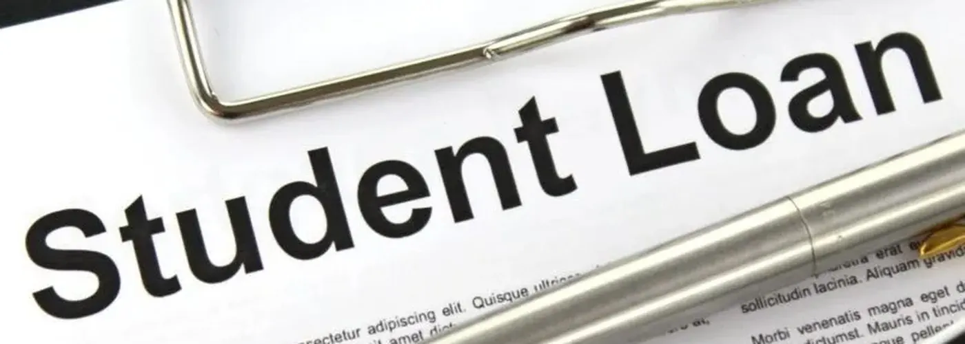 Student loan document on a clipboard